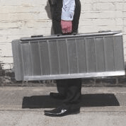 Buying a wheelchair ramp at Sync Living: Enable Access suitcase ramp