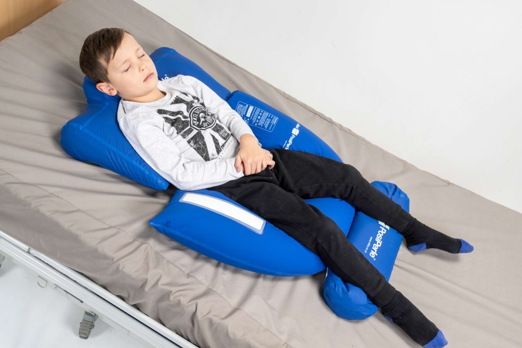 child using posiperle positioner